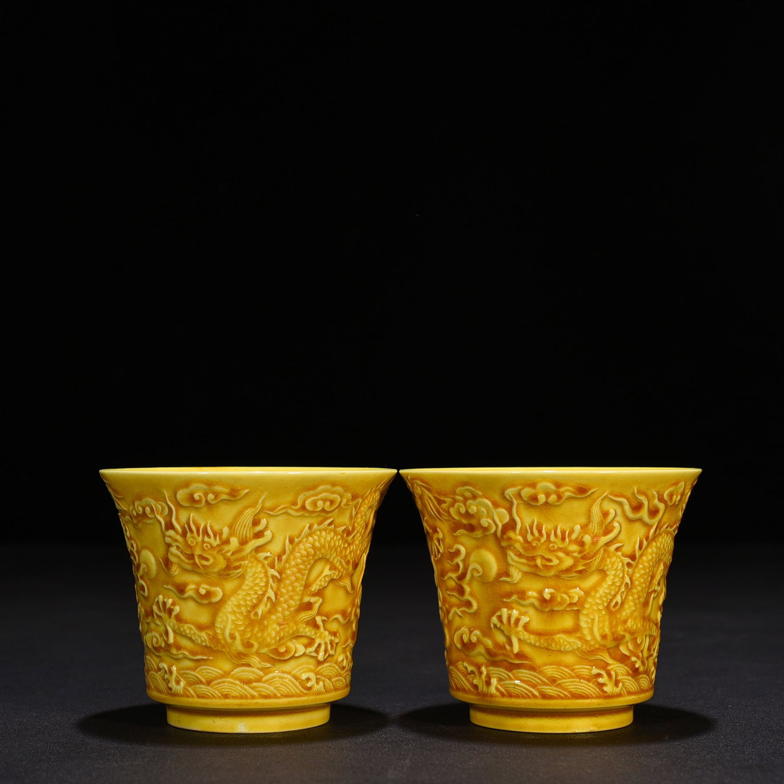 An Exquisite Chinese delicate yellow glaze carved dragon cup: Size: Height 7 cm - Widthh 8 cm Materials: Porcelain Dynasty: Ming dynasty Attribution: hongzhi Object: cup