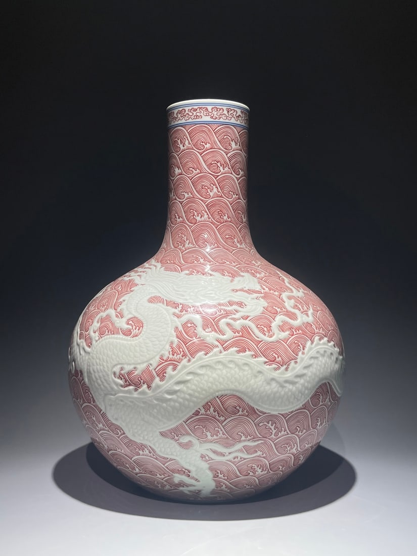 An Exquisite Chinese red underglaze and white heaps of carved dragon pattern Porcelain vase: Size: Height 45 cm - Width 32 cm Materials: Porcelain Dynasty: Qing Dynasty Attribution: Qianlong Period Object: Vase