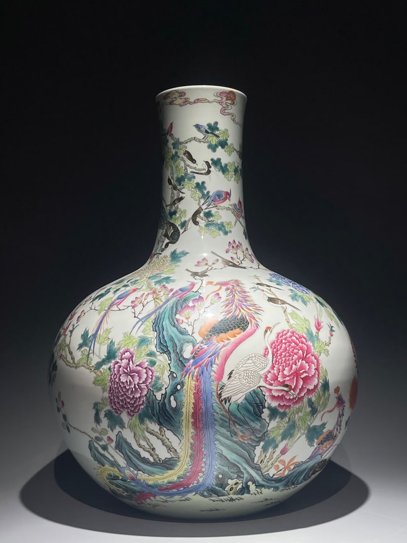 An Exquisite Chinese Famille Rose pastel colored celestial with birds and phoenixes Porcelain vase: Size: Height 59 cm - Width 43 cm Materials: Porcelain Dynasty: Qing Dynasty Attribution: Qianlong Period Object: Vase