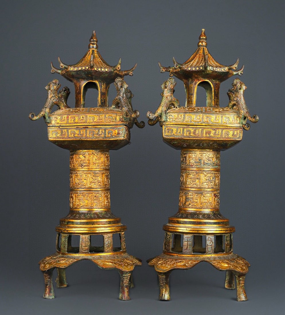 An Exquisite Chinese Pair of Bronze and Gold Palace Lanterns: Size: Height 54 cm - Width 21 cm Materials: Bronze Dynasty: Han dynasty Attribution: 1st to 3rd-C Object: Chinese Antiques