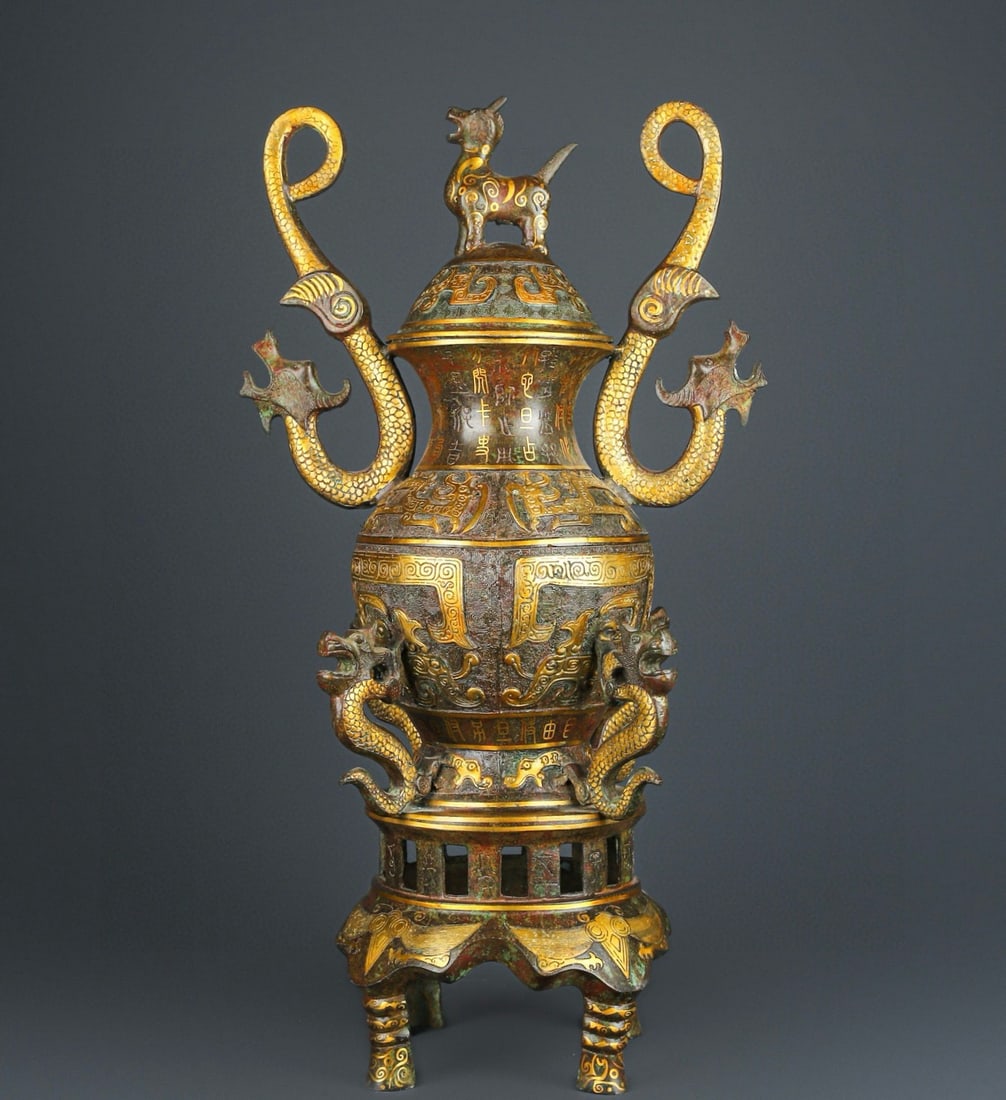 An Exquisite Chinese Bronze and gold double dragon round kettle: Size: Height 65 cm - Width 37 cm Materials: Bronze Dynasty: Han dynasty Attribution: 1st to 3rd-C Object: Chinese Antiques