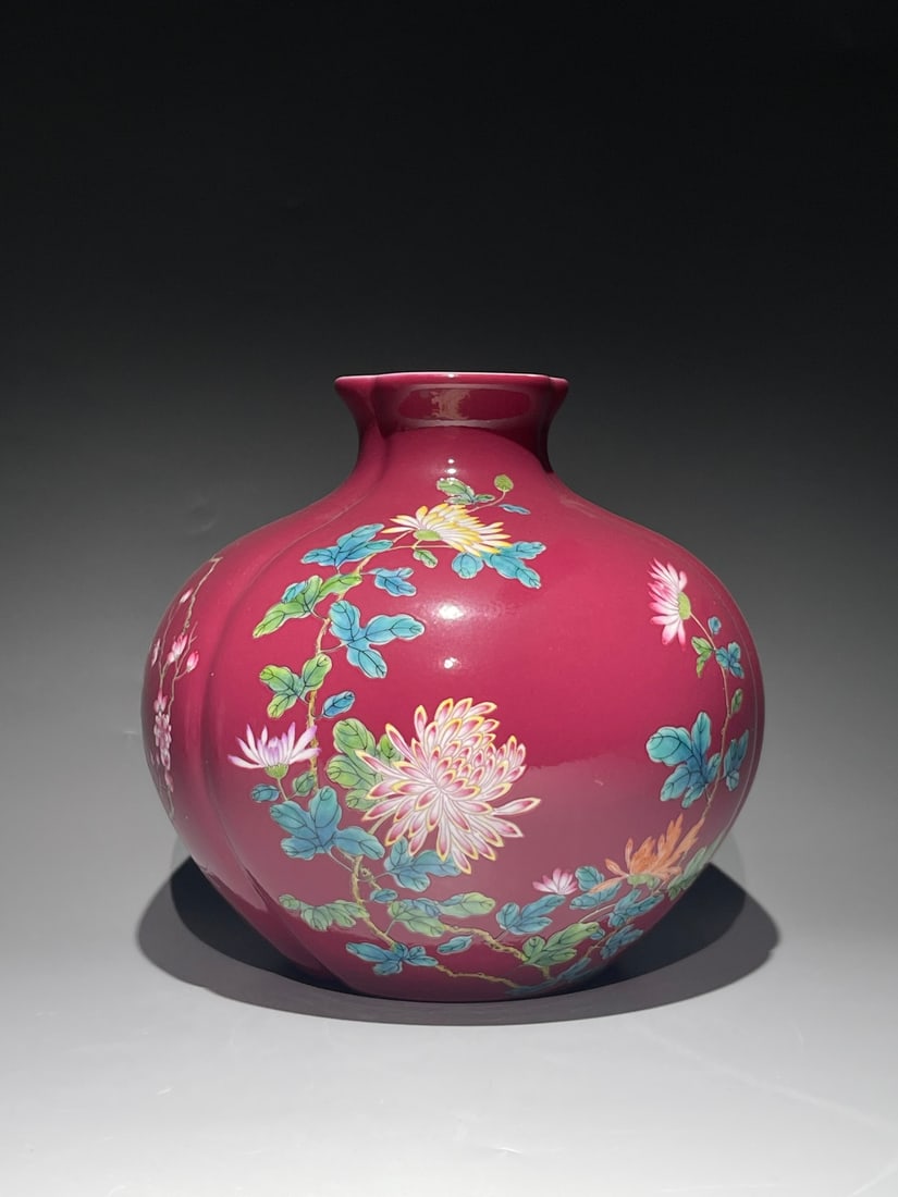 An Exquisite Chinese Famille Rose rouge ground pastel melon and pomegranate Porcelain vase: Size: Width 23 cm - Height 22.5 cm Materials: Porcelain Dynasty: Qing Dynasty Attribution: Yongzheng Period Object: vase
