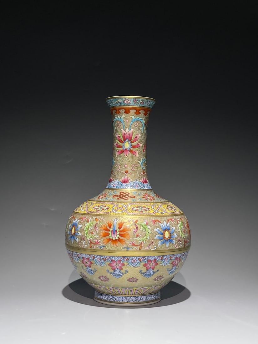 An Exquisite Chinese Famille Rose gold patterns on the branches of ferns and flowers Porcelain vase: Size: Height 22.5 cm - Width 14 cm Materials: Porcelain Dynasty: Qing Dynasty Attribution: Qianlong Period Object: Vase