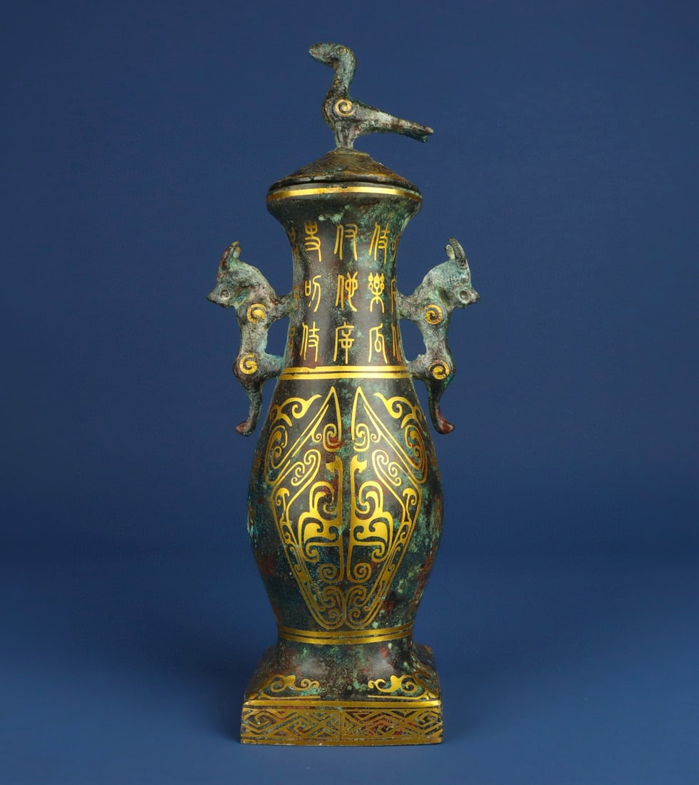 An Exquisite Chinese Bronze and gold double dragon square seat vase: Size: Height 35 cm - Width 14 cm Materials: Bronze Dynasty: Han dynasty Attribution: 1st to 3rd-C Object: Chinese Antiques