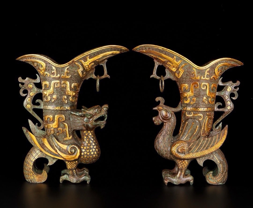 An Exquisite Chinese Bronze and gold dragon and phoenix cup: Size: Height 46 cm - Width 38 cm Materials: Bronze Dynasty: Han dynasty Attribution: 1st to 3rd-C Object: Chinese Antiques