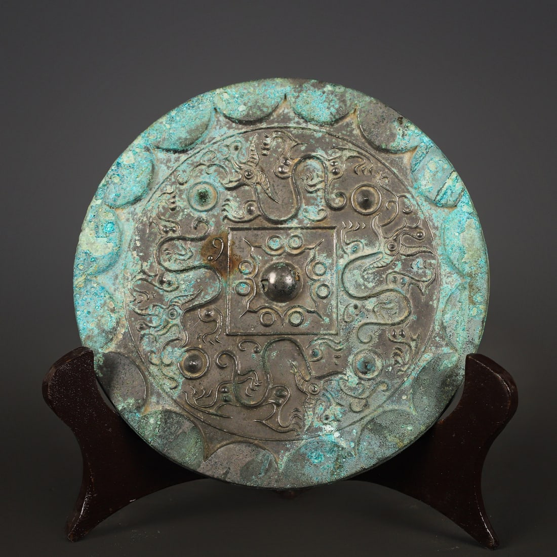 An Exquisite Chinese Bronze Nipple Mirror (1 of 10)