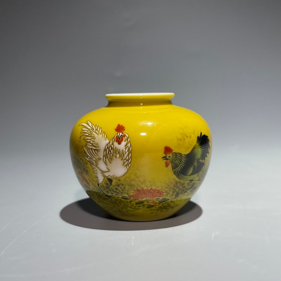 An Exquisite Chinese yellow background and three male figures Porcelain jar: Size: Width 6.8 cm - Height 5.8 cm Materials: Porcelain Dynasty: Qing Dynasty Attribution: Yongzheng Period Object: jar
