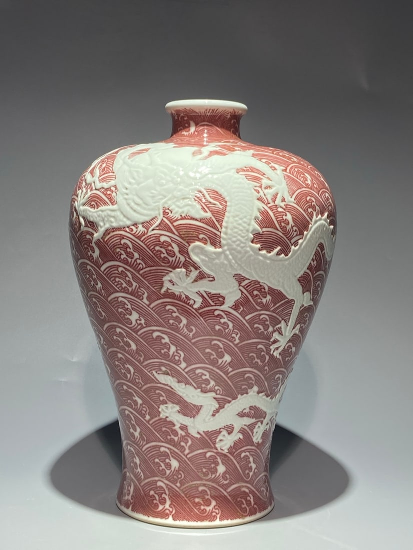 An Exquisite Chinese red underglaze and white carved dragon pattern Porcelain vase: Size: Height 35 cm - Width 23 cm Materials: Porcelain Dynasty: Qing Dynasty Attribution: Yongzheng Period Object: Vase