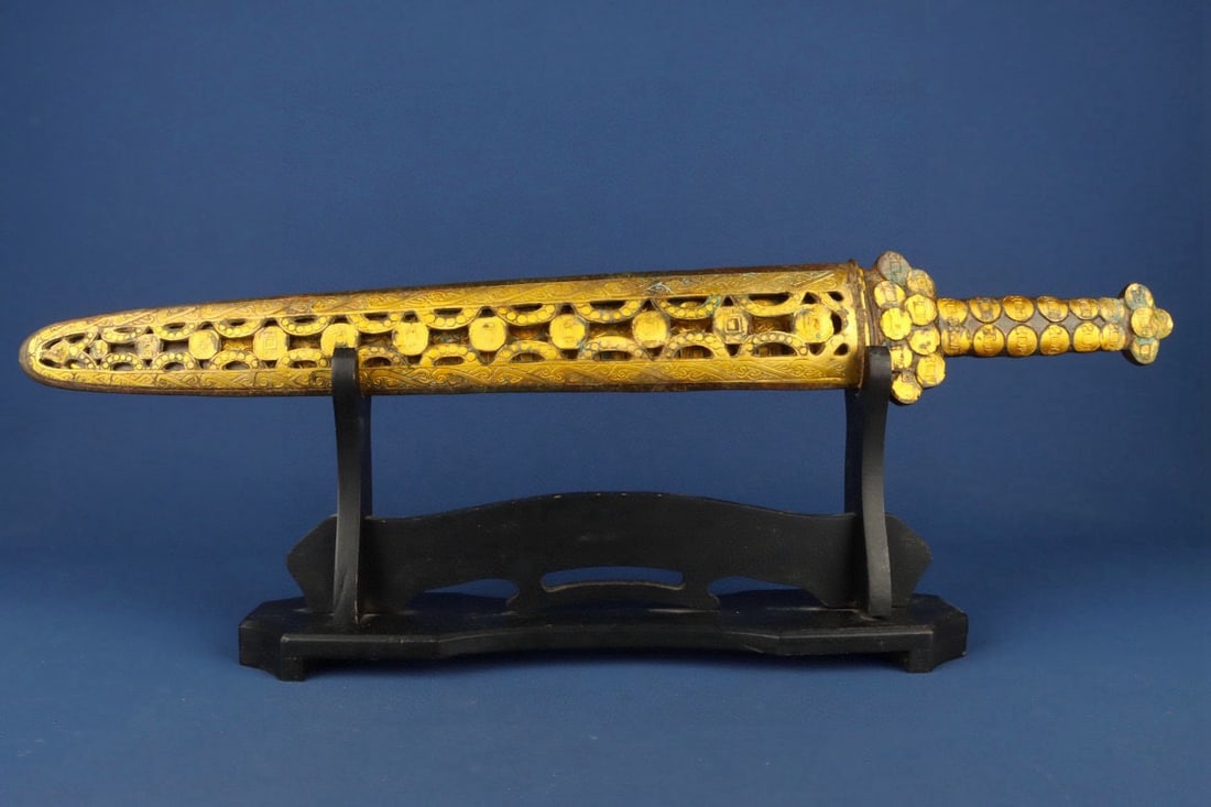 An Exquisite Chinese Bronze and gold inscribed sword: Size: Height 65 cm - Width 9 cm Materials: Bronze Dynasty: Han dynasty Attribution: 1st to 3rd-C Object: Chinese Antiques