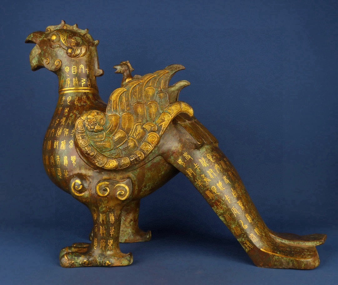 An Exquisite Chinese Bronze and gold bird statue: Size: Height 52 cm - Width 65 cm Materials: Bronze Dynasty: zhou dynasty Attribution: 700-BC Object: Chinese Antiques