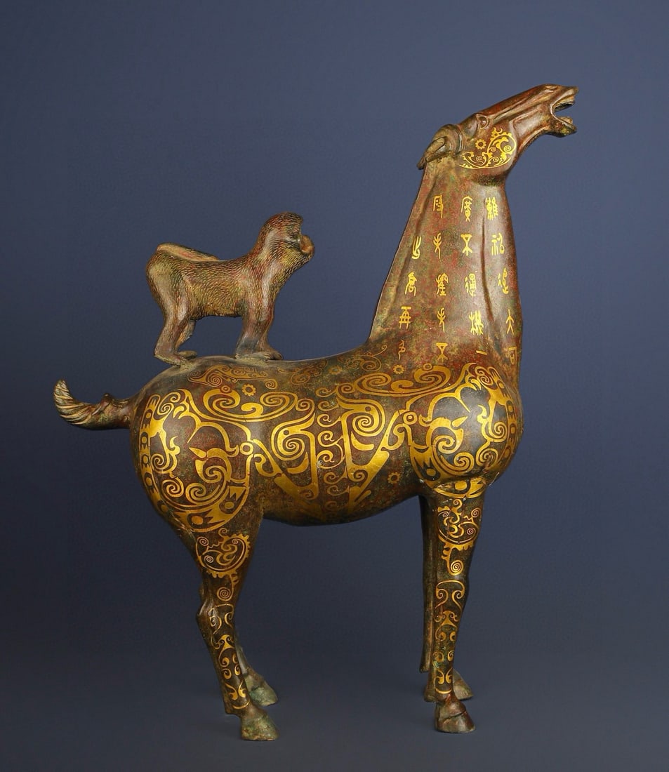 An Exquisite Chinese Bronze and gold mounted monkey: Size: Height 60.5 cm - Width 49.5 cm Materials: Bronze Dynasty: Han dynasty Attribution: 1st to 3rd-C Object: Chinese Antiques
