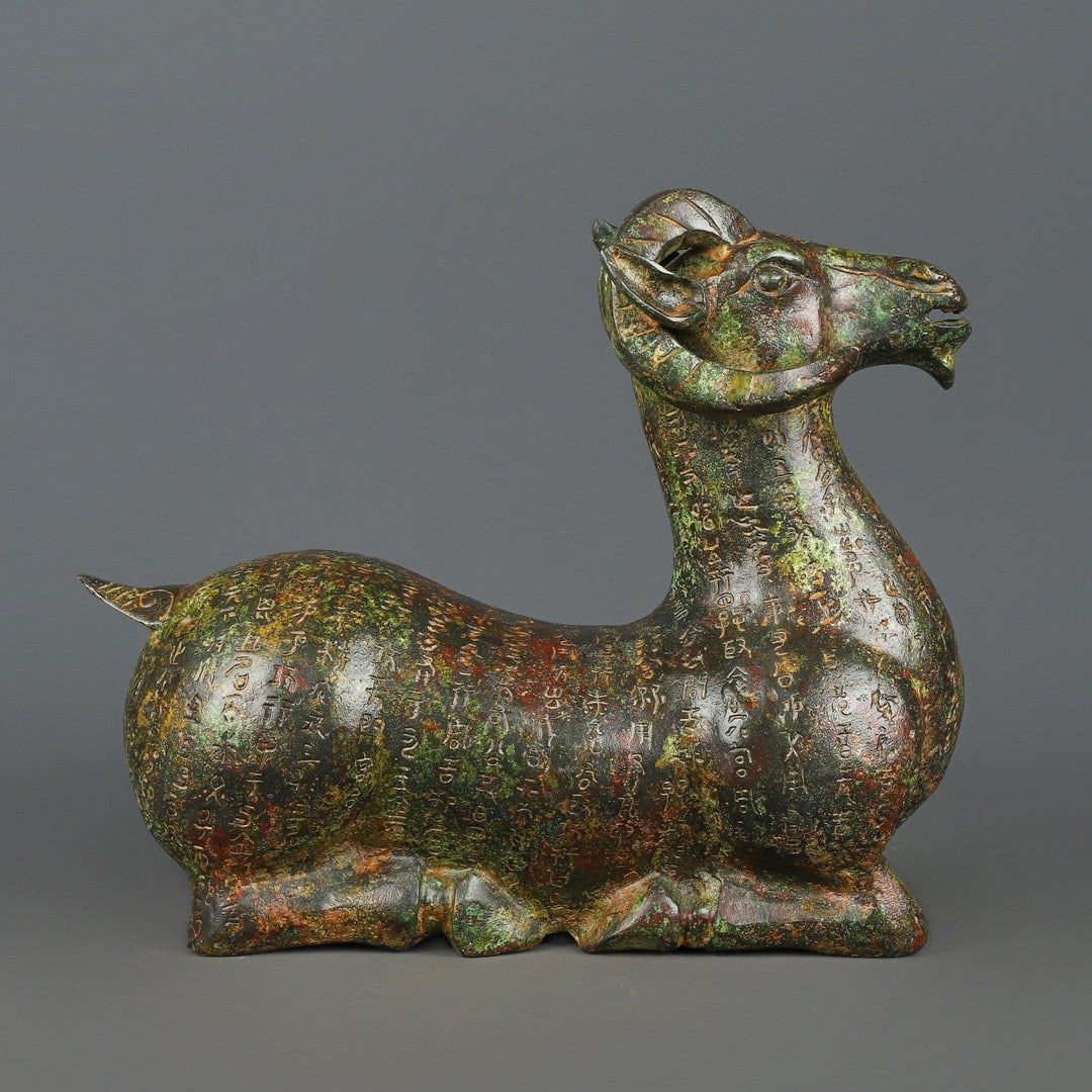 An Exquisite Chinese Bronze inscribed sheep statue: Size: Height 25 cm - Width 28 cm Materials: Bronze Dynasty: Han dynasty Attribution: 1st to 3rd-C Object: Chinese Antiques