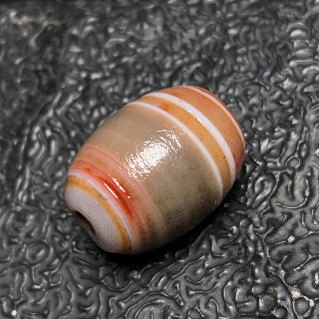 Chinese Natural Agate DZI Beads: Size: Width 2.6 cm - Height 2 cm Materials: Agate Dynasty: Qing dynasty Attribution: Qianlong Period Object: DZI Bead