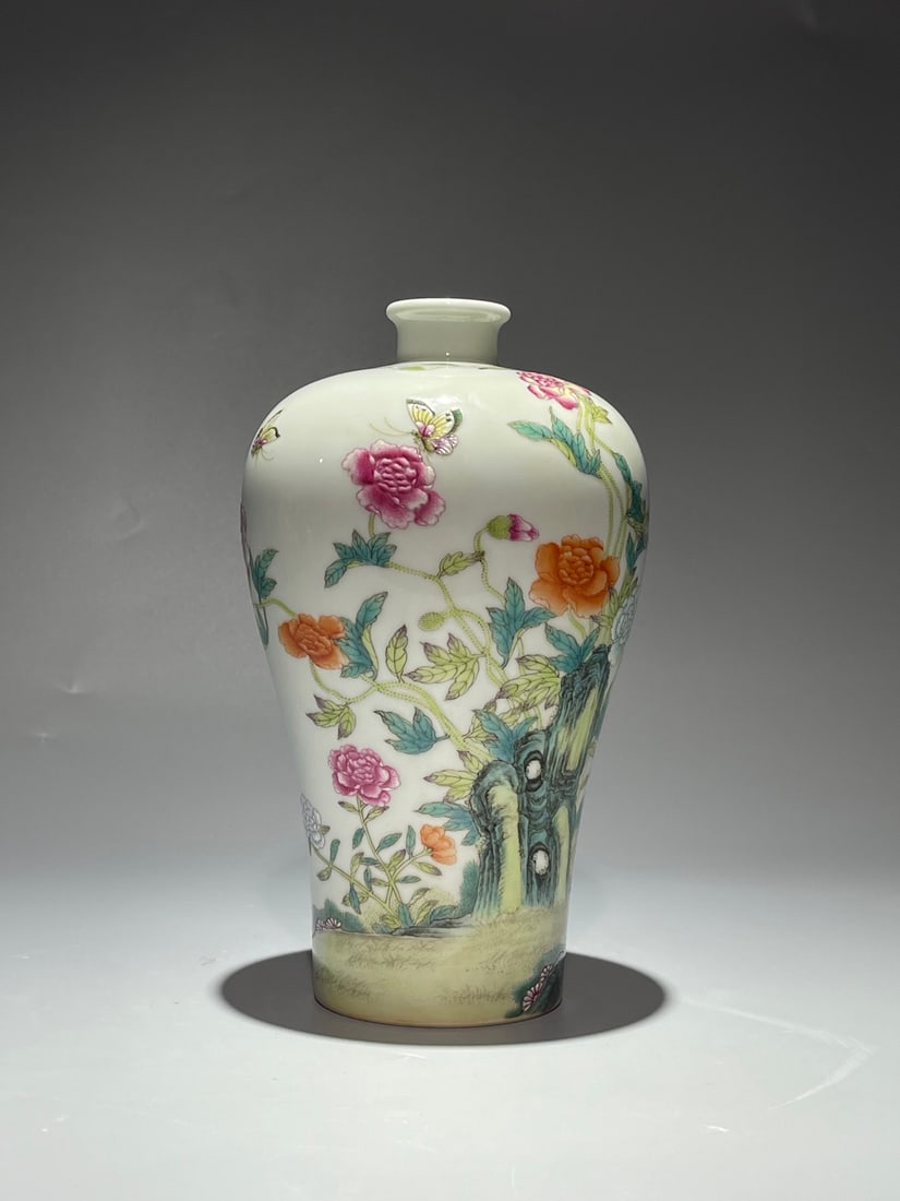 An Exquisite Chinese Famille Rose pastel plum butterflies and flowers Porcelain vase: Size: Height 20 cm - Width 12 cm Materials: Porcelain Dynasty: Qing Dynasty Attribution: Yongzheng Period Object: vase