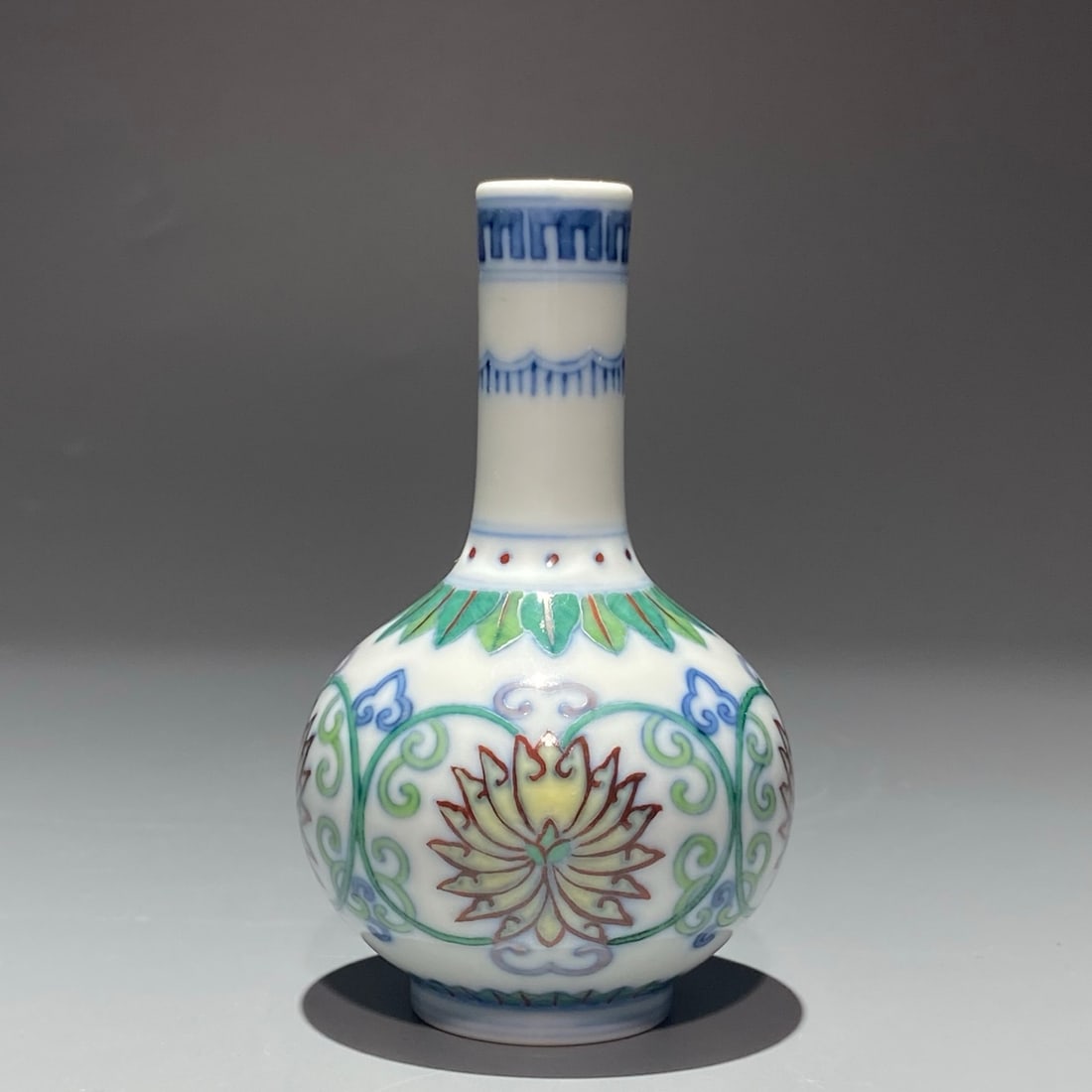 An Exquisite Chinese lotus pattern and colorful branches sphere Porcelain vase: Size: Height 10.8 cm - Width 6.5 cm Materials: Porcelain Dynasty: Qing Dynasty Attribution: Qianlong Period Object: vase