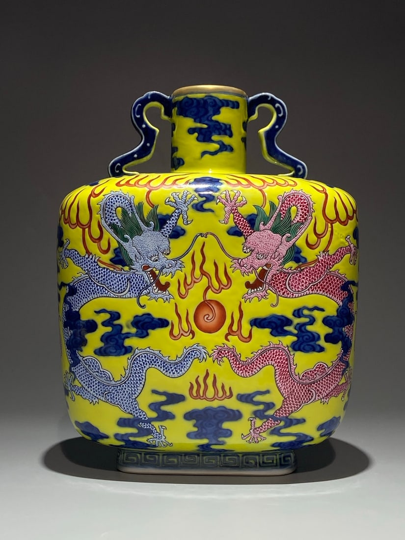 An Exquisite Chinese yellow ground blue and white with colorful double dragons Porcelain vase: Size: Height 25 cm - Width 19 cm Materials: Porcelain Dynasty: Qing Dynasty Attribution: Qianlong Period Object: vase