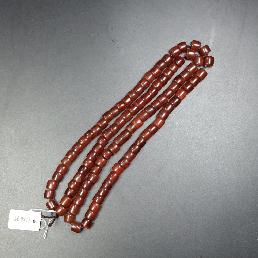Chinese Natural Agate DZI Beads: Size: Width 0.9 cm - Height 0.8 cm Materials: Agate Dynasty: Qing dynasty Attribution: Qianlong Period Object: bead