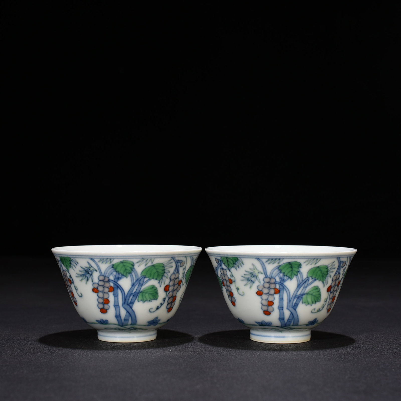 An Exquisite Chinese Doucai Grape Pattern Cup: Size: Height 4.6 cm - Widthh 8 cm Materials: Porcelain Time Period:Ming dynasty Attribution: chenghua Object: cup