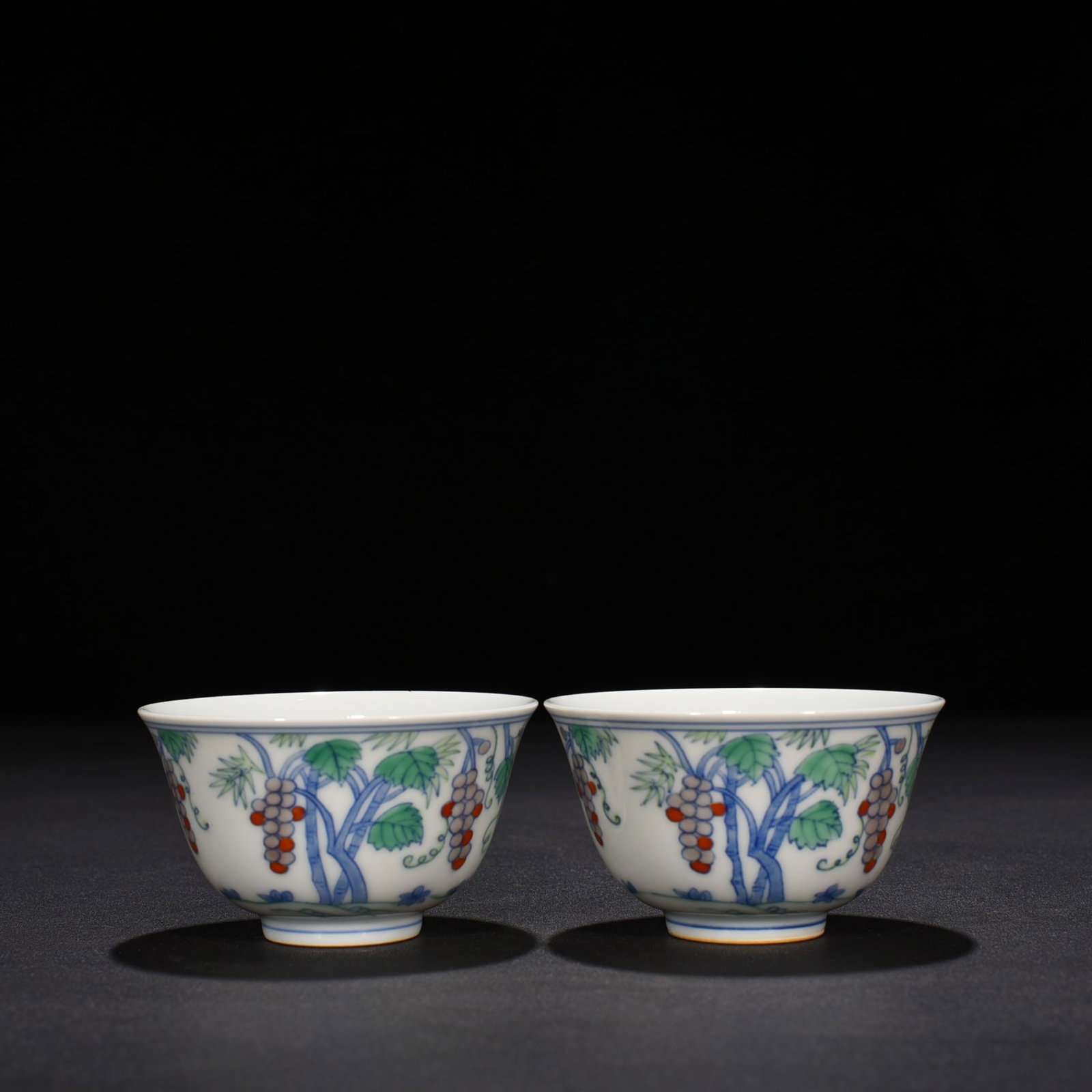 An Exquisite Chinese Doucai Grape Pattern Cup: Size: Height 4.8 cm - Widthh 8 cm Materials: Porcelain Time Period:Ming dynasty Attribution: chenghua Object: cup