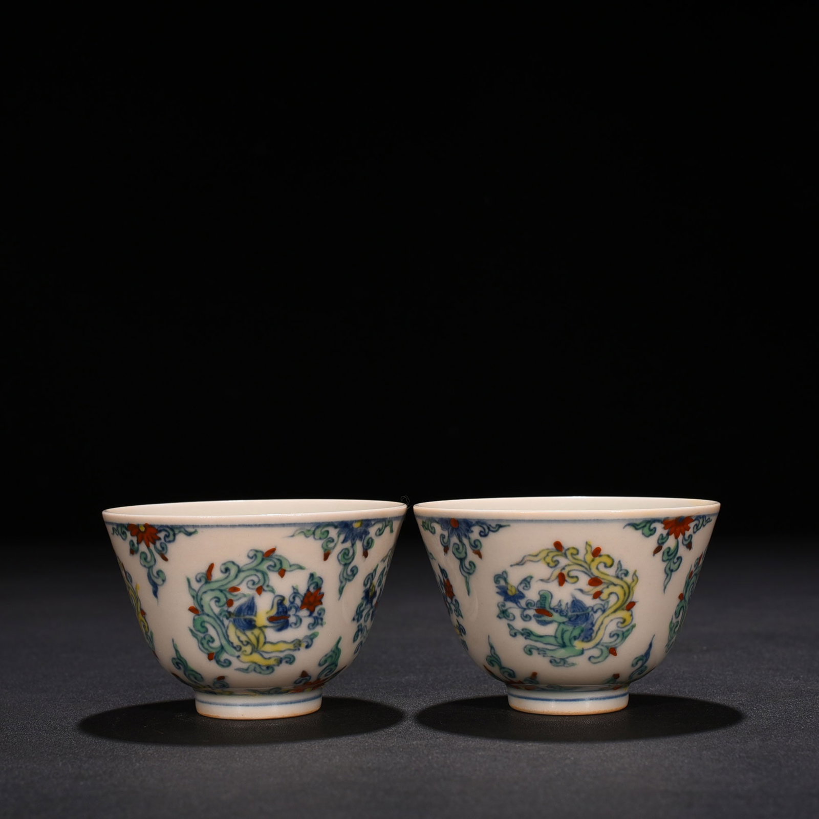 An Exquisite Chinese Doucai Dragon Pattern Cup: Size: Height 5 cm - Widthh 7.5 cm Materials: Porcelain Time Period:Ming dynasty Attribution: chenghua Object: cup