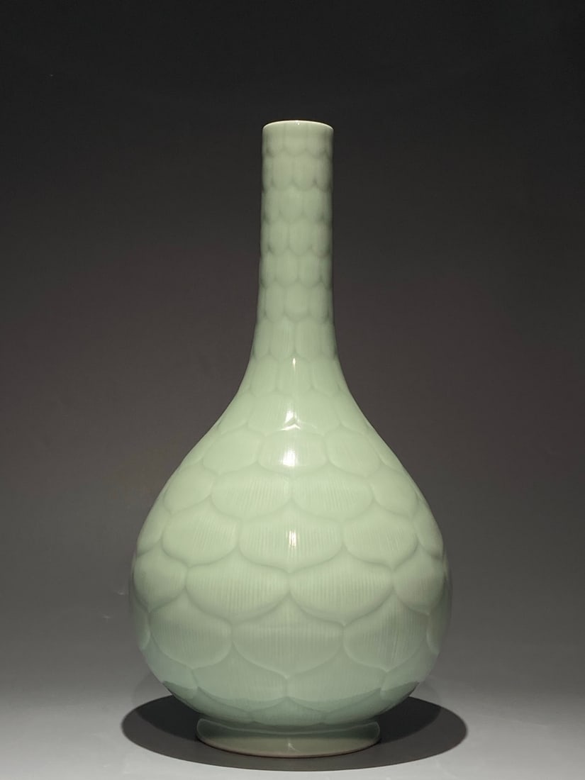 An Exquisite Chinese green celadon glazed dragons branches and lotus patterns Porcelain vase: Size: Height 41.3 cm - Width 22 cm Materials: Porcelain Dynasty: Qing Dynasty Attribution: Qianlong Period Object: vase