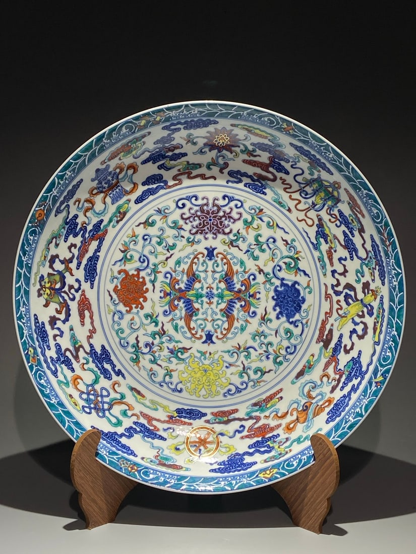 An Exquisite Chinese doucai colourful double phoenixes and eight pattern Porcelain plate: Size: Width 50.8 cm - Height 9 cm Materials: Porcelain Dynasty: Qing Dynasty Attribution: Qianlong Period Object: plate