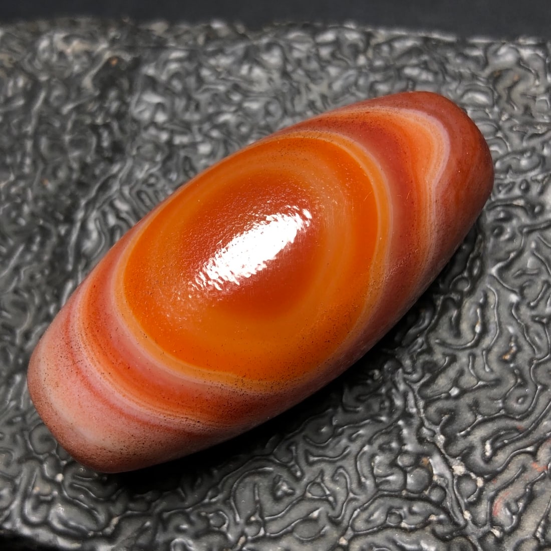 Chinese Natural Agate DZI Beads: Size: Width 4.9 cm - Height 2.4 cm Materials: Agate Dynasty: Qing dynasty Attribution: Qianlong Period Object: Dzi Beads