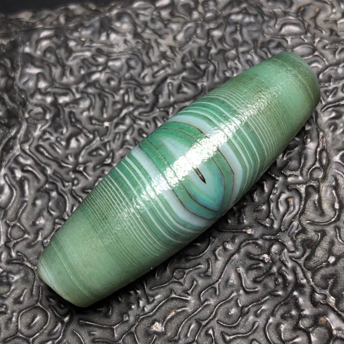 Chinese Natural Agate DZI Beads: Size: Width 4.3 cm - Height 1.4 cm Materials: Agate Dynasty: Qing dynasty Attribution: Qianlong Period Object: Dzi Beads
