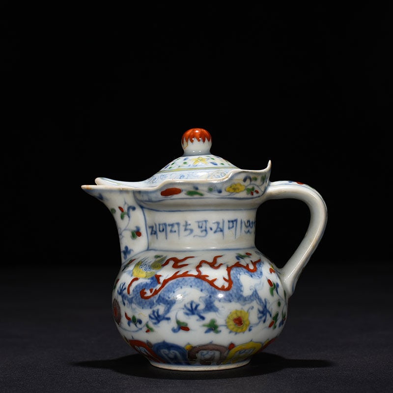 An Exquisite Chinese doucai monk hat pot: Size: Height 11 cm - Widthh 10 cm Materials: Porcelain Time Period:Ming dynasty Attribution: chenghua Object: pot