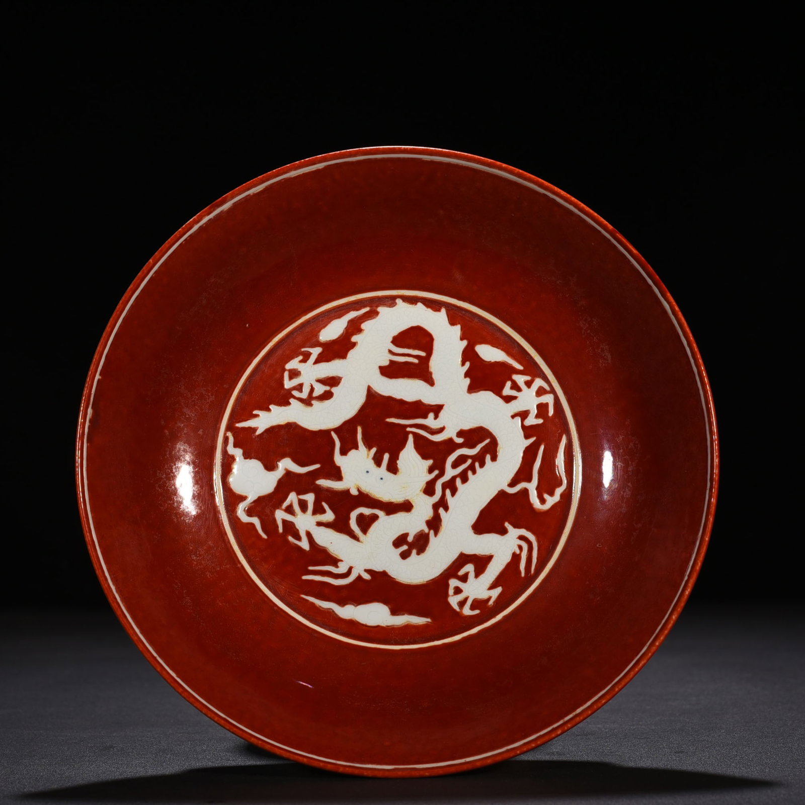 An Exquisite Chinese red glaze plate: Size: Height 4.5 cm - Widthh 21 cm Materials: Porcelain Time Period:Ming dynasty Attribution: chenghua Object: plate