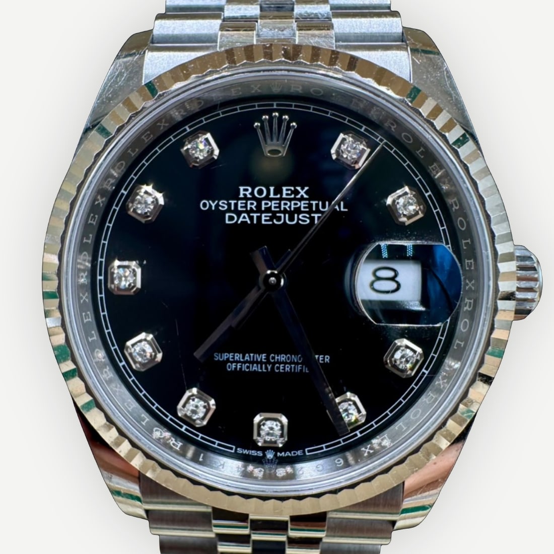 ROLEX Datejust 36 Ref. 126234 Automatic Wristwatch, Stainless Steel & Platinum, Black Diamond Dial: For more than seven decades, the Rolex Datejust has defined the modern luxury wristwatch. Instantly recognizable yet remarkably versatile, it remains one of the Maison's most enduring and influential 