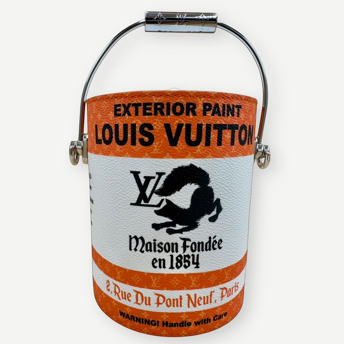 LOUIS VUITTON Paint Can Bag, Orange, Louis Dreamhouse Collection by Virgil Abloh: Among the most recognizable designs from Virgil Abloh's Louis Dreamhouse collection, the Paint Can Bag reflects the designer's celebrated approach to elevating familiar objects through innovation, cra