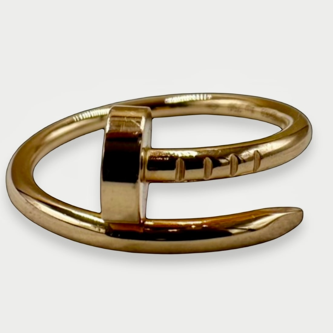 CARTIER Juste un Clou Ring, Small Model, 18K Yellow Gold, EU Size 48 (US 4.25) Full Set: Cartier's Juste un Clou collection is celebrated for its ability to elevate a simple industrial form into an elegant jewelry icon.Rendered in yellow gold, this Small Model ring carries the collection'