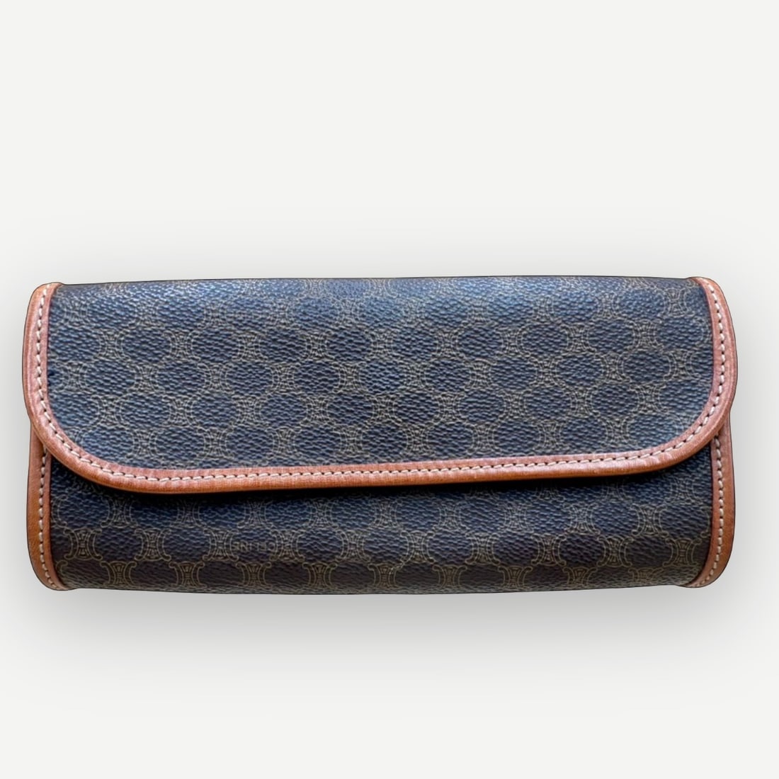 CELINE Vintage Macadam Cylinder Cosmetic Pouch, Macadam Canvas & Leather: A distinctive example of vintage Celine craftsmanship, this Vintage Macadam Cylinder Cosmetic Pouch is rendered in the MaisonÕs iconic Macadam canvas with smooth tan leather trim. Its elegant cylindr