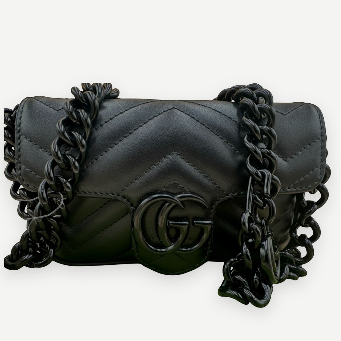 GUCCI GG Marmont Mini Shoulder Bag, Black Matelassé Leather, Black Hardware, With Original Dust: Heritage The GG Marmont collection is one of Gucci's most enduring modern signatures — a design that distills the house's Roman heritage and Alessandro Michele's maximalist romanticism into a silhou