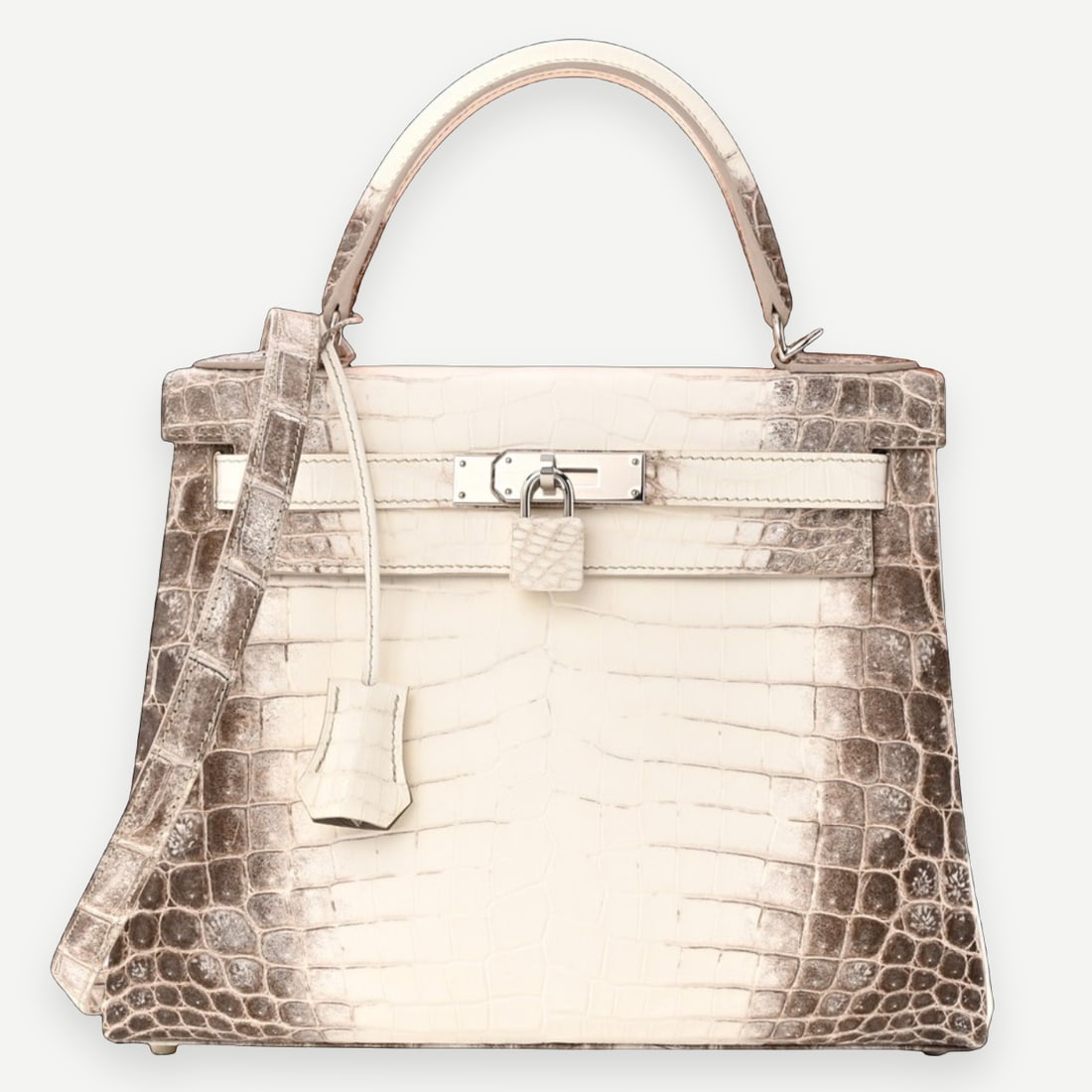 HERMES Kelly 25 Retourne, Himalaya Matte Niloticus Crocodile, PHW, Full Set, 2024: Heritage The Hermès Kelly in Himalaya Niloticus Crocodile is not the rarest bag in the world. It is the rarest bag in the world by consensus — a designation arrived at independently by ever