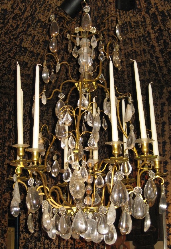 19TH CENTURY BRONZE AND ROCK CRYSTAL CHANDELIER: BRONZE DORE WITH NINE LIGHTS, NOT ELECTRIFIED Measurements: H 40" X D 24"