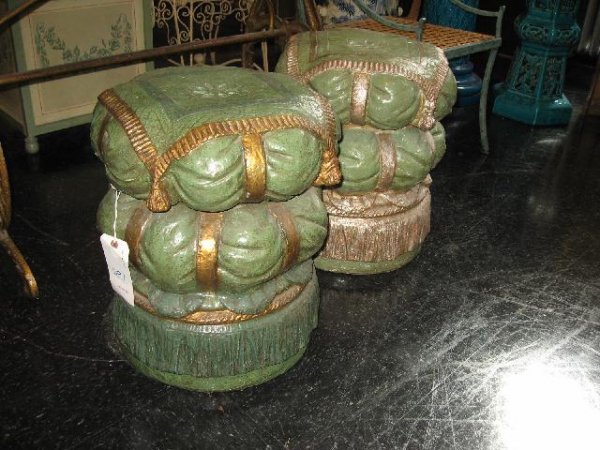 A PAIR OF GREEN AND GOLD COMPOSITION STOOLS: PAINTED TROMPE L'OEIL DEISGN AS A STACK OF PILLOWS, Height 19", diameter 16", WITH AN IDENTICAL PAIR IN NATURAL CAST STONE