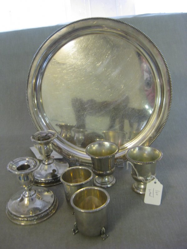 A GROUP OF SEVEN SILVER OBJECTS, including a pair o: A GROUP OF SEVEN SILVER OBJECTS, including a pair of International Sterling silver candlesticks, four sterling silver vessels and a nickel silver tray.