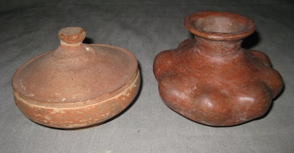 TWO TERRA COTTA VESSELS, one Pre-Colombian eight lo: TWO TERRA COTTA VESSELS, one Pre-Colombian eight lobed vase, height 3 1/2", and one Middle Eastern covered bowl, diameter 5"