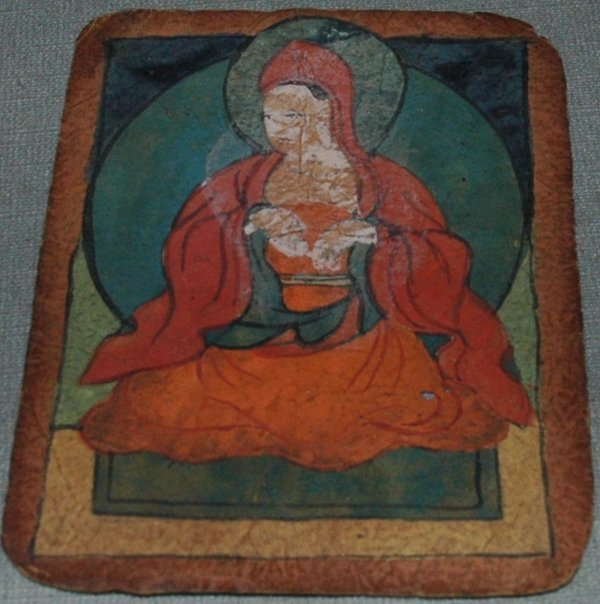 A TIBETAN BUDDHA, watercolor and ink on paper, cal: A TIBETAN BUDDHA, watercolor and ink on paper, calligraphy on verso, height 4 1/2", width 3 1/2"