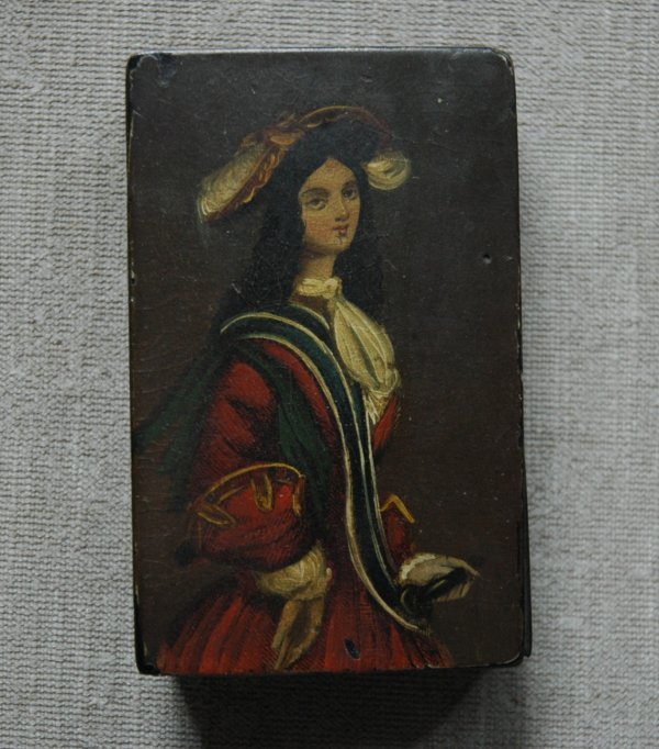 A EUROPEAN PAPER MACHE SNUFF BOX, 19th Century or : A EUROPEAN PAPER MACHE SNUFF BOX, 19th Century or earlier, portrait of a woman cavalier, hinged lid, width 2 1/4", length 3 3/4"