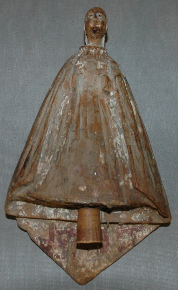 A ROBED FIGURE, 17th Century or earlier, carved wo: A ROBED FIGURE, 17th Century or earlier, carved wood with traces of paint, height 9 3/4"