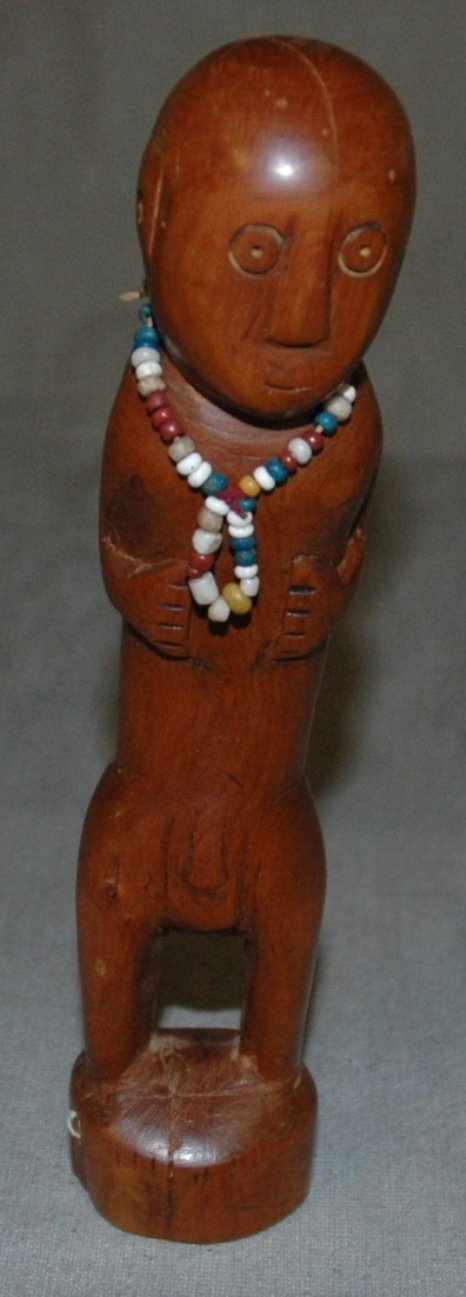 A CARVED WOOD MALE STANDING FIGURE, height 7 3/4": A CARVED WOOD MALE STANDING FIGURE, height 7 3/4"