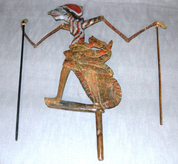 AN INDONESIAN SHADOW PUPPET, height 18 1/2": AN INDONESIAN SHADOW PUPPET, height 18 1/2"
