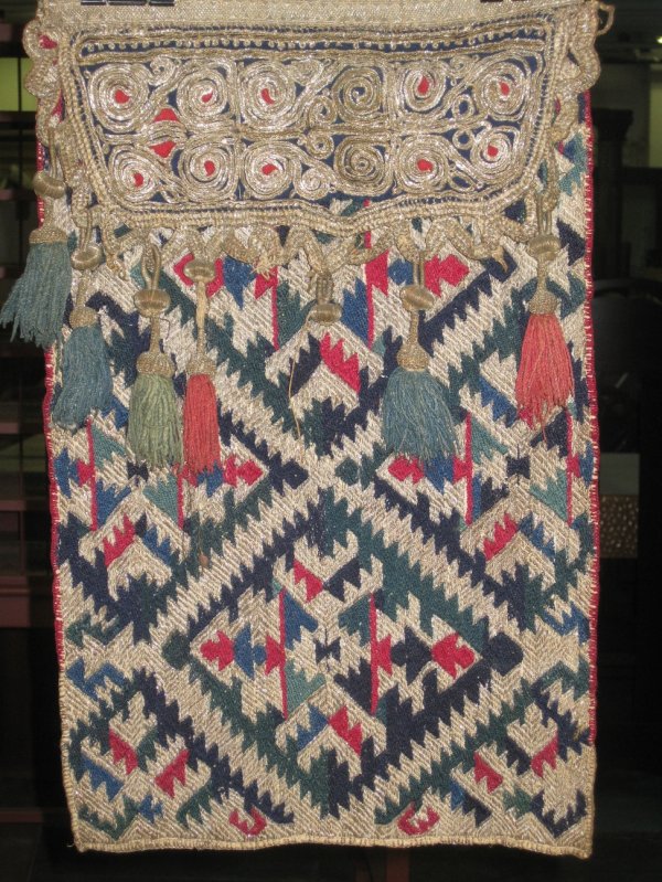 A YOMUD BAG FACE, woven wool with metallic threads: A YOMUD BAG FACE, woven wool with metallic threads, length 19", width 12"