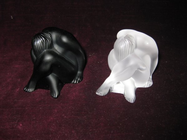 PAIR OF LALIQUE BLACK AND FROSTED GLASS SEATED FIG: PAIR OF LALIQUE BLACK AND FROSTED GLASS SEATED FIGURES