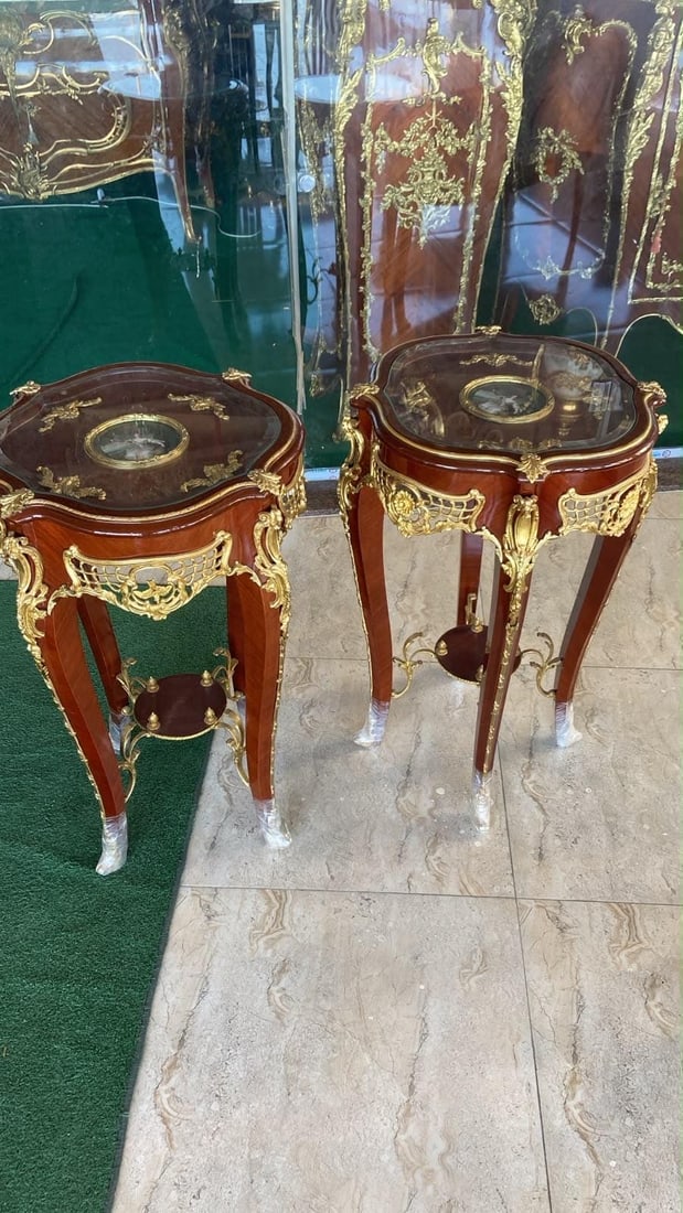 Pair of French Louis XV End Tables | Mahogany &: COMING SOON - RESERVE NOW Only one pair available. Elevate your interior with this magnificent pair of French Louis XV side tables, handcrafted from solid mahogany and adorned with exquisite gilt bron