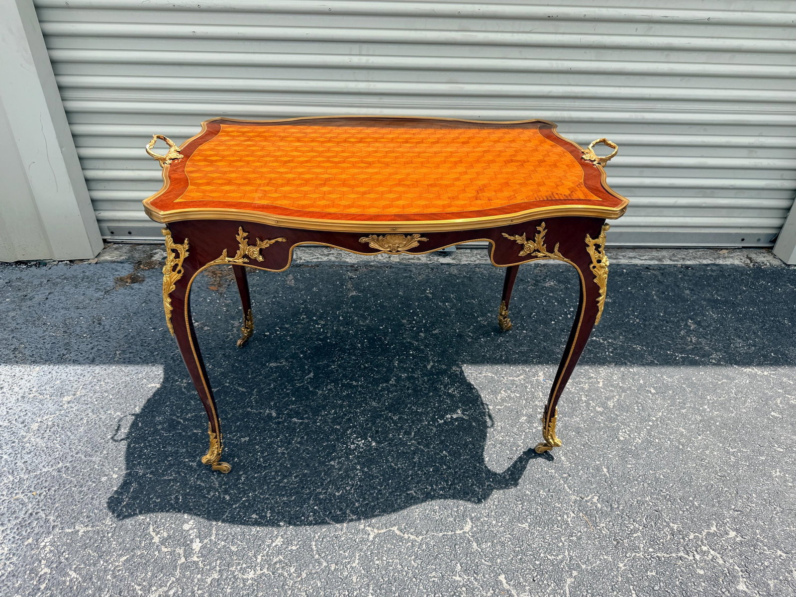French Louis XV Marquetry Serving Table – Gilt: CONDITION NOTE (SURFACE MARKS) The table is in excellent overall condition and fully functional. Please note there are light surface marks visible on the top, primarily from protective packing and han