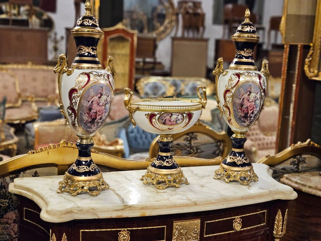 Pair of Large Hand-Painted Porcelain Urns with: Dimensions (Approx, Each): Height: 75 cm (29.5 in) Width: 35 cm (13.7 in) Depth: 30 cm (11.8 in) Description: This stunning pair of monumental porcelain urns embodies the elegance of 19th-century